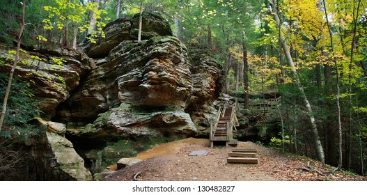 A Cliff Face And Wooden Stairs In Autumn At Ash Cave In The Hocking Hills Region Of Central Ohio, USA