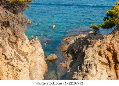 Cliff Jump On The Coast Of Punta De Sureda, Spain, Lloret De Mar, 4 August 2018