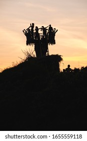 Cliff Jump, Premantura, Croatia - 07/19/2019 - Persons On A Watchtower At Sunset