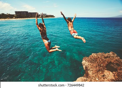 Cliff Jumping Into The Ocean, Summer Fun Adventure Lifestyle