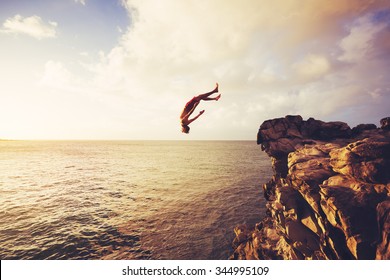 Cliff Jumping Into The Ocean At Sunset, Summer Fun Lifestyle