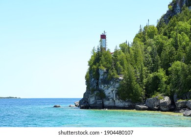 Cliff landscape view with lighthouse 