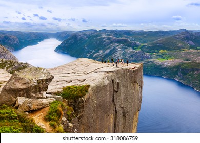Cliff Preikestolen in fjord Lysefjord - Norway - nature and travel background - Shutterstock ID 318086759
