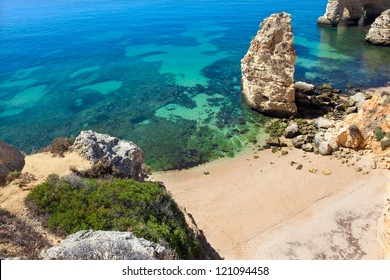 Cliffs At Algarve Beach, South Of Portugal