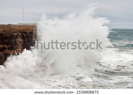 Cliffs hit by big waves. Dangerous surfing area. Portugal. Cape St. Vincent. Sagres. Beach for advanced surfers, also great to get some sun because it is protected by the wind.