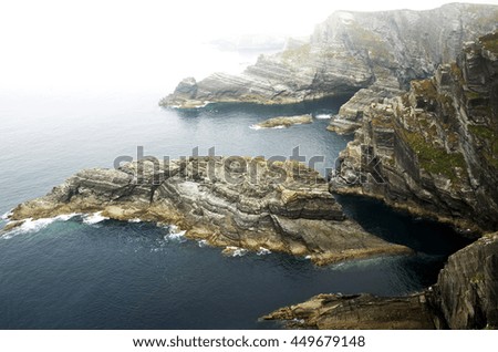 Similar – A big cloud hangs over a fjord