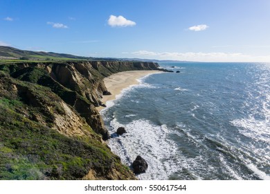 Cliffs and large half moon shaped beach, Pacific Ocean Coast, Half Moon Bay, California