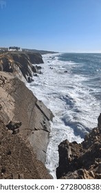Cliffs of Lighthouse Penedo da Saudade in Saint Pedro de Moel at the west coast of Portugal (Farol do Penedo da Saudade)