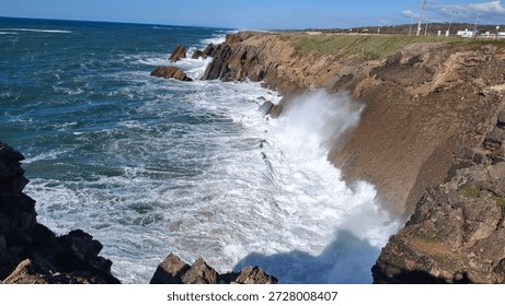 Cliffs of Lighthouse Penedo da Saudade in Saint Pedro de Moel at the west coast of Portugal (Farol do Penedo da Saudade)