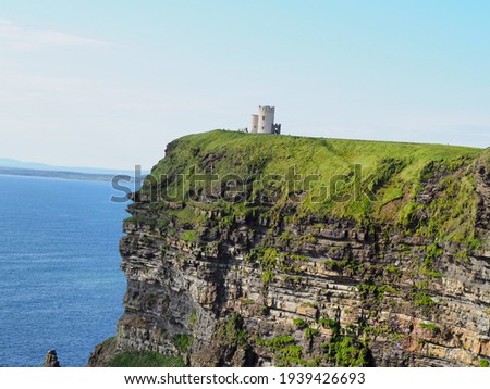 Cliffs of Mohar- small white building