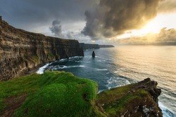 Cliffs Of Moher Above The Atlantic Ocean At Sunset, Ireland.