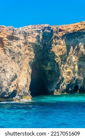 Cliffs Over The Crystal Lagoon Of Comino Island, Malta