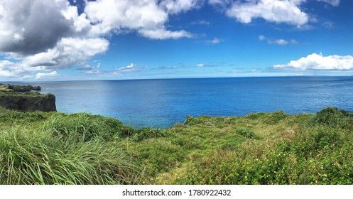 Cliffs Overhang The Ocean In Okinawa, Japan