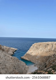 “Rocky cliffs overlooking the deep blue sea”