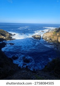 cliffs, rugged, dramatic, coastal, windswept, rocky, steep, towering, ocean, waves, crashing, erosion, jagged, horizon, wild, natural, scenic, breathtaking, misty, windy, saltwater, shoreline, precipice, height, abyss, panoramic, remote, untamed, serene, vast, geological, strata, layers, ancient, formation, edge, vertical, sheer, drop, foam, tide, seascape, isolation, beauty, powerful, nature, erosion, winds, spray