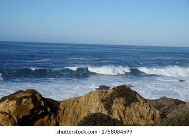 cliffs, rugged, dramatic, coastal, windswept, rocky, steep, towering, ocean, waves, crashing, erosion, jagged, horizon, wild, natural, scenic, breathtaking, misty, windy, saltwater, shoreline, precipice, height, abyss, panoramic, remote, untamed, serene, vast, geological, strata, layers, ancient, formation, edge, vertical, sheer, drop, foam, tide, seascape, isolation, beauty, powerful, nature, erosion, winds, spray