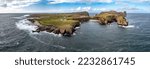 The cliffs and sea stacks An Tor Mor and the Wishing Stone at Port Challa on Tory Island, County Donegal, Ireland