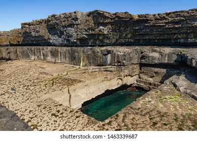 Cliffs And Worm Hole In Inishmore, Aran Islands, Ireland