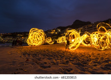 CLIFTON BEACH - CAPE TOWN, SOUTH AFRICA - DECEMBER 2015 - Cape Town Clifton Beach Fire Dancer Festival