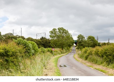 Clifton Countryside.  The View Along A Country Lane In Clifton Northern England Towards The West Coast Main Line.