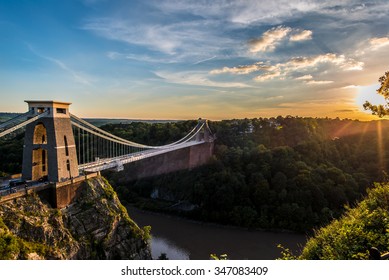 Clifton Suspension Bridge, Bristol, UK with sunset and sunbeams - Powered by Shutterstock