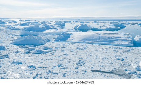 Climate Change. Iceberg Afrom Glacier In Arctic Nature Landscape On Greenland. Icebergs In Ilulissat Icefjord. Melting Of Glaciers And The Greenland Ice Sheet Is A Cause Of Sea Levels Rise.