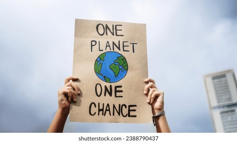 Climate change protest. People fighting for environmental and global warming crisis holding sign banners - Powered by Shutterstock