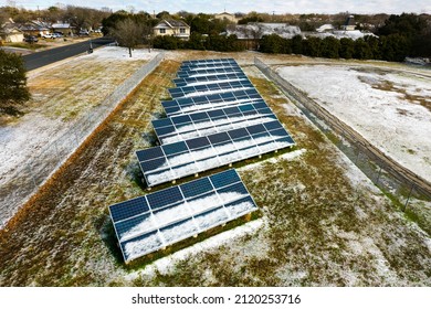 Climate Change At Solar Farm In Texas After Winter Storm Covers Solar Panels In Snow And Ice