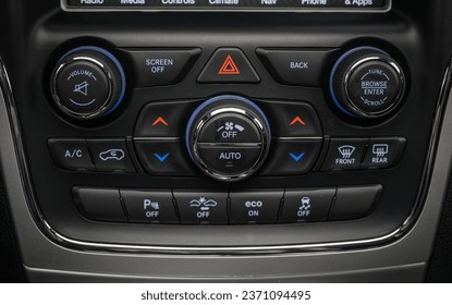 Climate control buttons inside of a suv