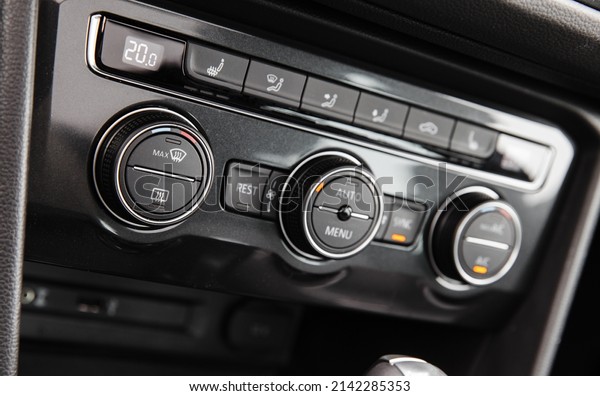 Climate control panel of modern luxury\
crossover car. Close up photo with selective\
focus