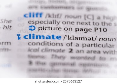 Climate word in a dictionary. Selective focus, close up.
