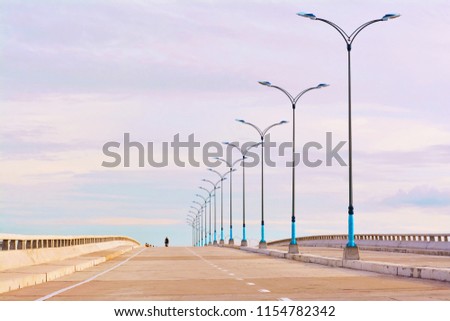 climb bridge road with line of street light