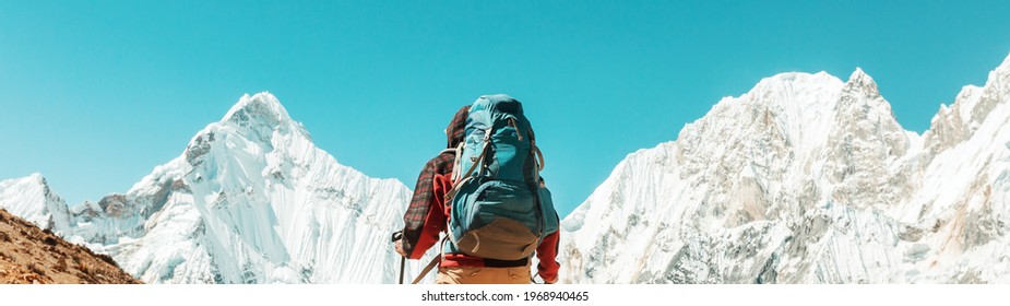 The climb in high snowy mountains - Shutterstock ID 1968940465