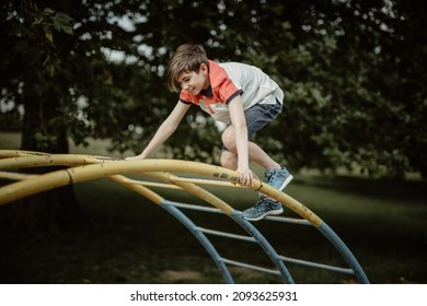 Climb To The Top Of Climbing Frame Build Skills And Fitness While Growing Up And Being A Happy And Self Confident  Young Teen Boy