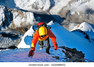 Climber Ascending The Everest Summit. Nepal, Himalayas