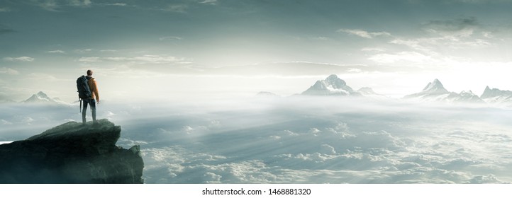 Climber on a summit freedom - Shutterstock ID 1468881320
