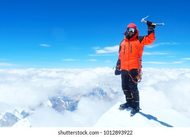 Climber Reaches The Summit Of Everest. Mountain Peak Everest. Highest Mountain In The World. National Park, Nepal