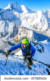 A climber reaching the summit