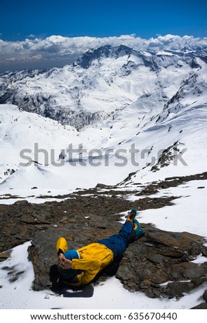 Similar – Image, Stock Photo Backpacker resting.