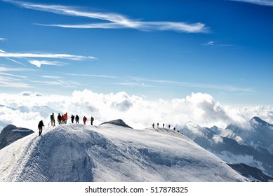 climbers climbing the mountain with mountain equipment, high mountain activity