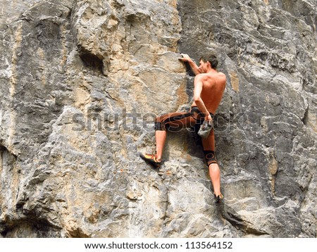 Climbing.