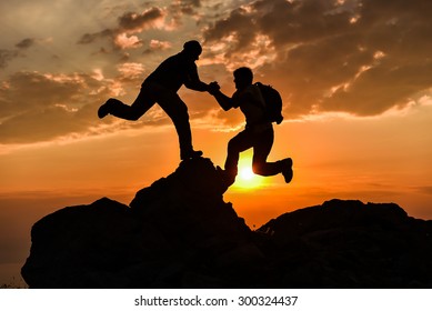 climbing assistance - Shutterstock ID 300324437