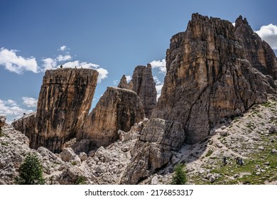 Climbing in Cinque Torri,Dolomites,Italy.Five towers and rock formations close to Cortina d'Ampezzo attract many climbers.Picturesque Dolomite Alps,active summer holiday,steep cliffs.Adventure concept