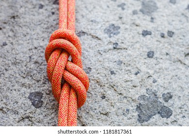 Climbing Eight Rope Knot On Rocky Background