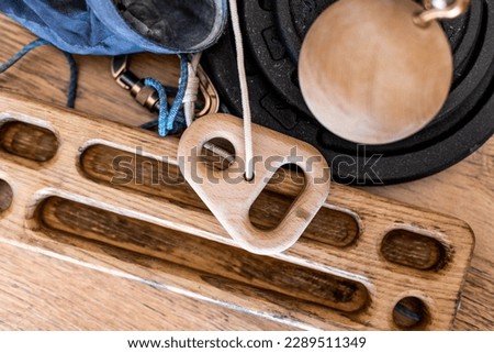 climbing equipment. finger and hand strength training. wooden finger trainers. fingerboard and hangboard