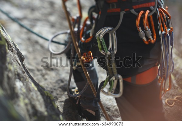 Climbing\
gear and equipment closeup. Tilt-Shift\
effect.