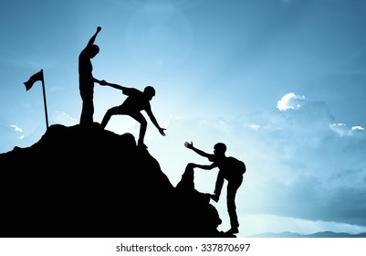 climbing helping  team work , success concept 