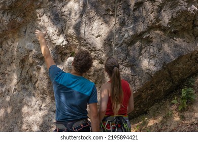 Climbing instructor showing the way - Powered by Shutterstock