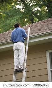 Climbing the ladder to perform roofing inspection