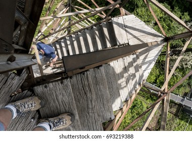 Climbing An Old Fire Tower Steps.